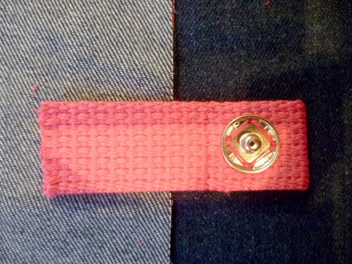 Pink strap with small bronze button