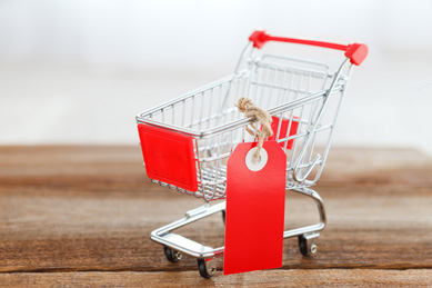 Little toy red shopping cart