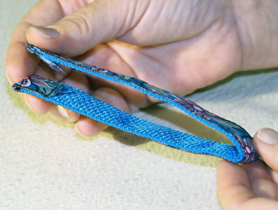 Finished blue floral webbing