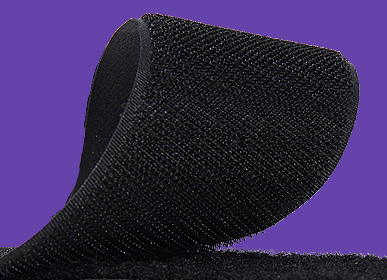 A roll of black VELCRO hook and loop