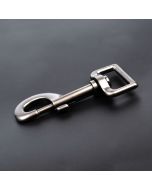 A dark gray gunmetal snap hook on a black background