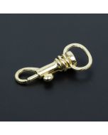 Brass snap hook on a black background