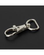 A silver nickle lanyard trigger snap on a black background