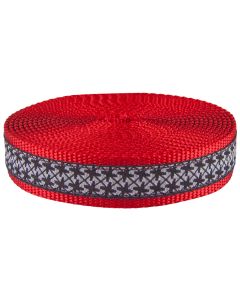 White jacquard ribbon with black pinwheels sewn onto red nylon webbing
