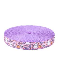 A roll of purple ribbon-overlay nylon webbing featuring a cute pink Halloween pattern with ghosts, pumpkins, skulls, witch hats, and candy accents.