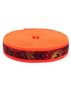 Red and orange paisley patterns on grosgrain ribbon sewn onto neon orage nylon webbing
