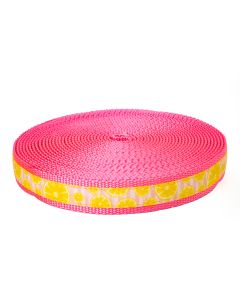 Pink striped background with lemons printed on grosgrain ribbon that's sewn onto pink nylon webbing