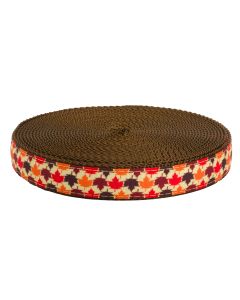 Grosgrain ribbon with red, orange, and brown leaves printed on it sewn onto brown nylon webbing
