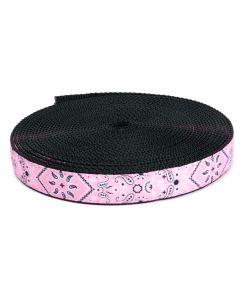 Pink grosgrain ribbon with a bandana pattern printed on it sewn onto black nylon webbing