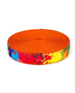 Bright, multi-colored grosgrain ribbon that looks like it's had different colors of paint splattered on it sewn onto orange nylon webbing