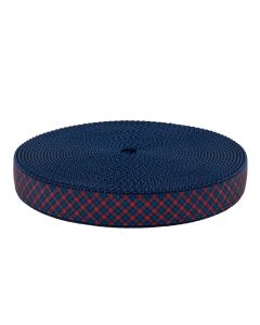 Grosgrain ribbon with red and blue plaid printed on it sewn onto navy blue nylon webbing