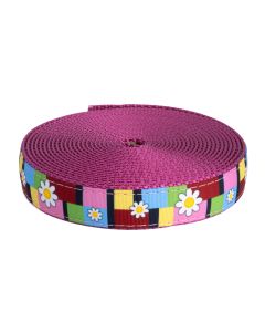 Multi colored grosgrain ribbon with daisies printed on it sewn onto rose colored nylon webbing