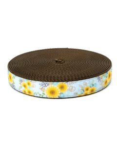 Sky blue grosgrain ribbon with sunflowers and blue spring flowers printed on it sewn onto brown nylon webbing
