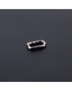Nickel plated rectangle ring on a dark background