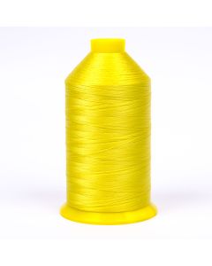 A spool of bright yellow thread
