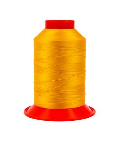 A spool of light orange thread