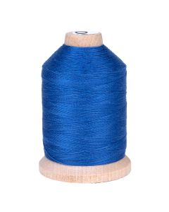 A spool of blue colored thread 