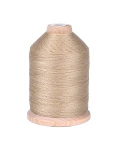 A spool of a shade of tan thread