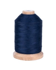 A spool of navy blue thread