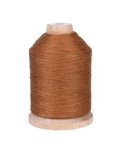 A spool of light brown thread 