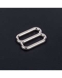 3/4 Inch Metal Round Triglide Slide with a black background