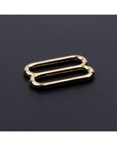 1 Inch Brass Plated Metal Round Wide Mouth Triglide Slide with a dark background