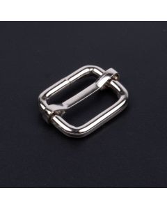 3/4 Inch Metal Sliding Bar Triglide Buckle with a black background