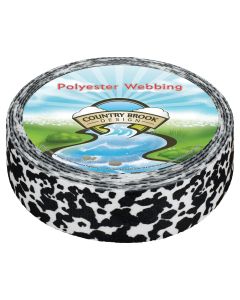 A roll of black and white cow print polyester webbing