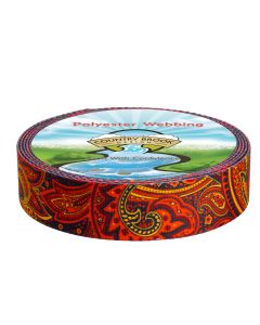 A roll of polyester webbing with red, yellow, and orange paisleys printed onto it