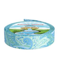 A roll of polyester webbing with blue and green paisleys printed onto it