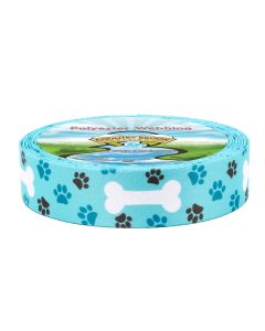 A roll of teal polyester webbing with blue and black pawprints surrounding larger cartoon dog bones printed onto it