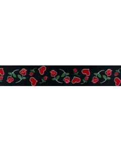 Black background that makes the pattern pop with repeating red heart shapes intertwined with rose buds and small blossoms