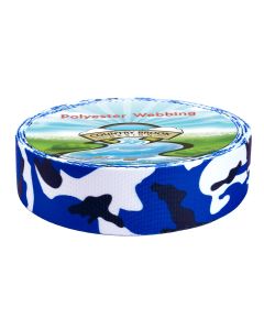 Bright royal blue background with white, black, and dark navy camo accents