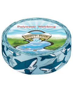 A roll of blue polyester webbing with cartoon sharks and waves printed onto it