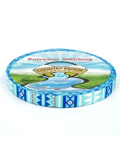Roll of webbing with Blue, Teal, and White designs on it