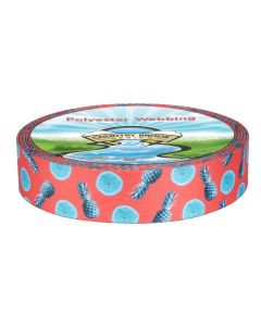 A roll of orange polyester webbing with teal pineapples and oranges printed onto it