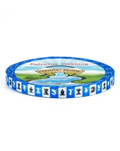 A roll of polyester webbing with blue and white squares with different chess pieces printed in them, some upside down some rightside up
