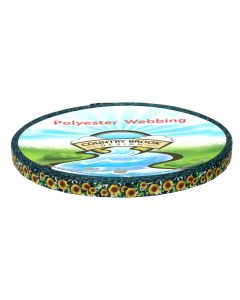 Polyester webbing with sunflowers against a cow print background printed onto it