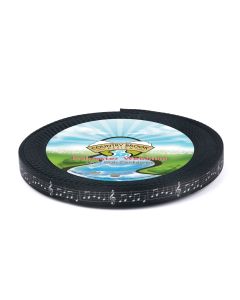 A roll of black polyester webbing with white musical notes on music lines printed onto it