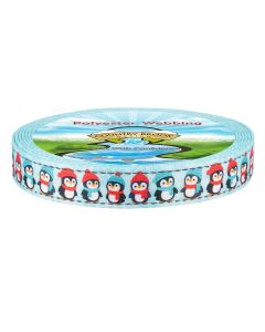 A roll of Country Brook Design polyester webbing featuring a light blue background printed edge with cute penguins wearing red and teal winter hats and scarves.