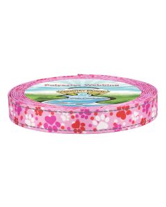 A roll of pink polyester webbing featuring a pattern of hearts and paw prints.
