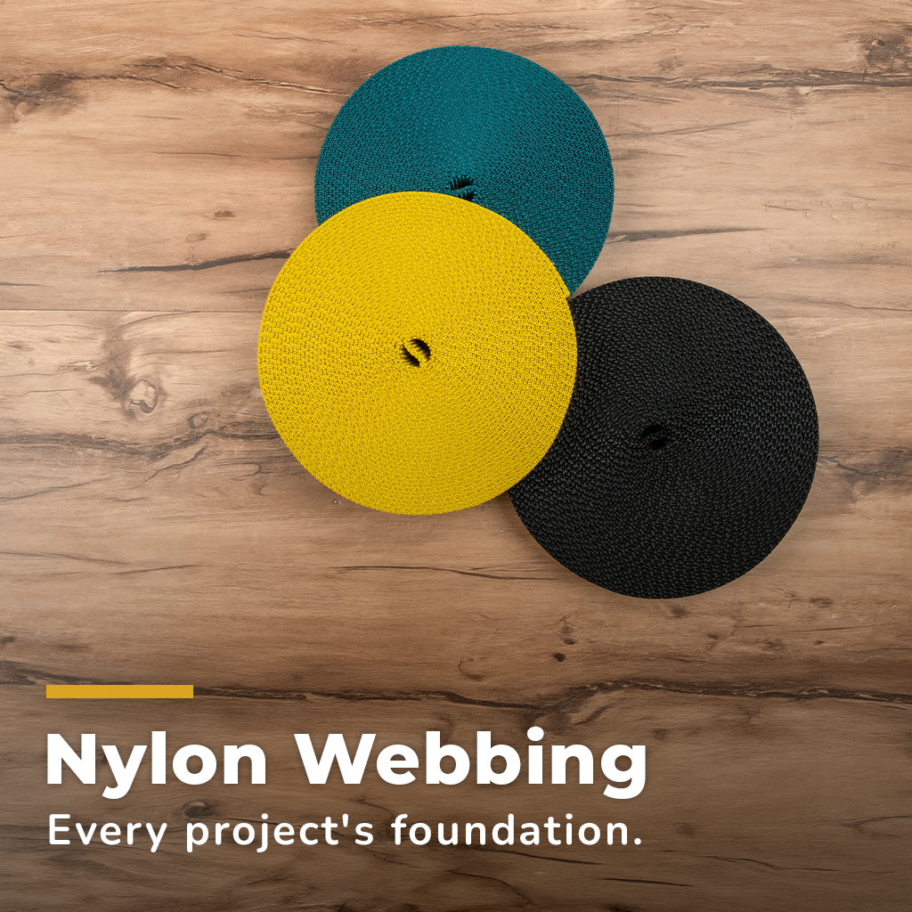Nylon Webbing. Photo of orange nylon webbing curled.