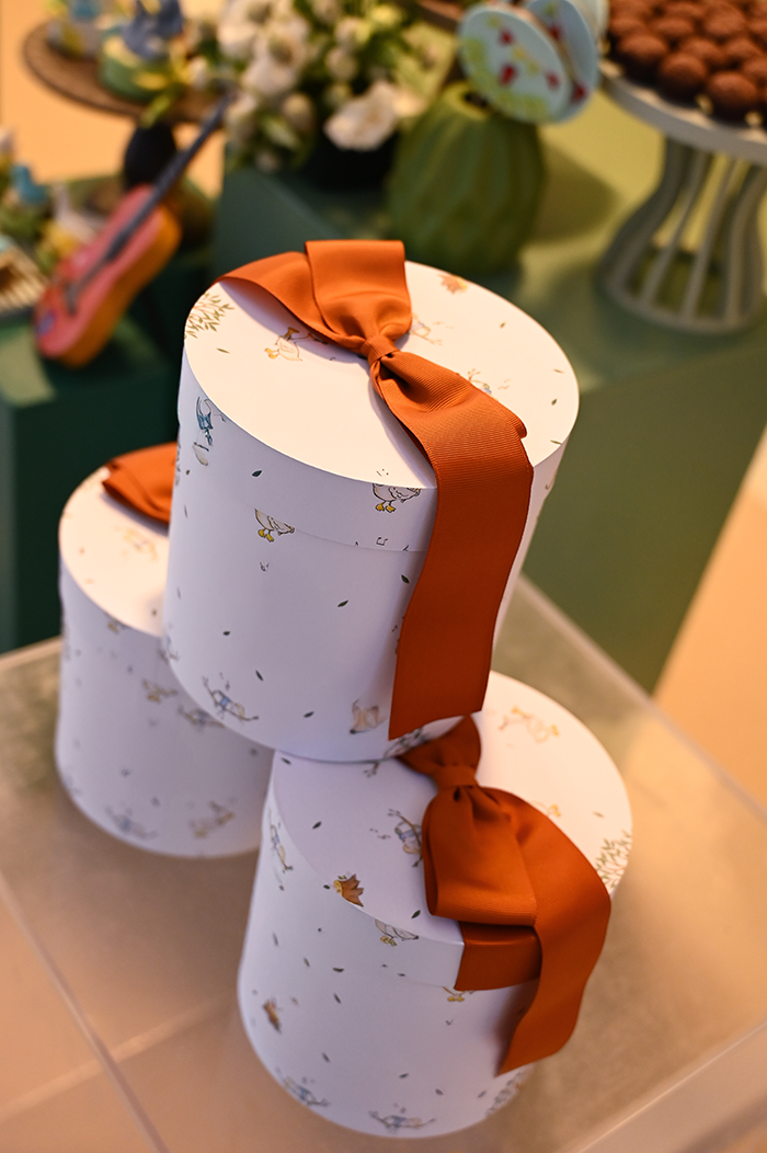 Gifts wrapped with burnt orange grosgrain ribbon