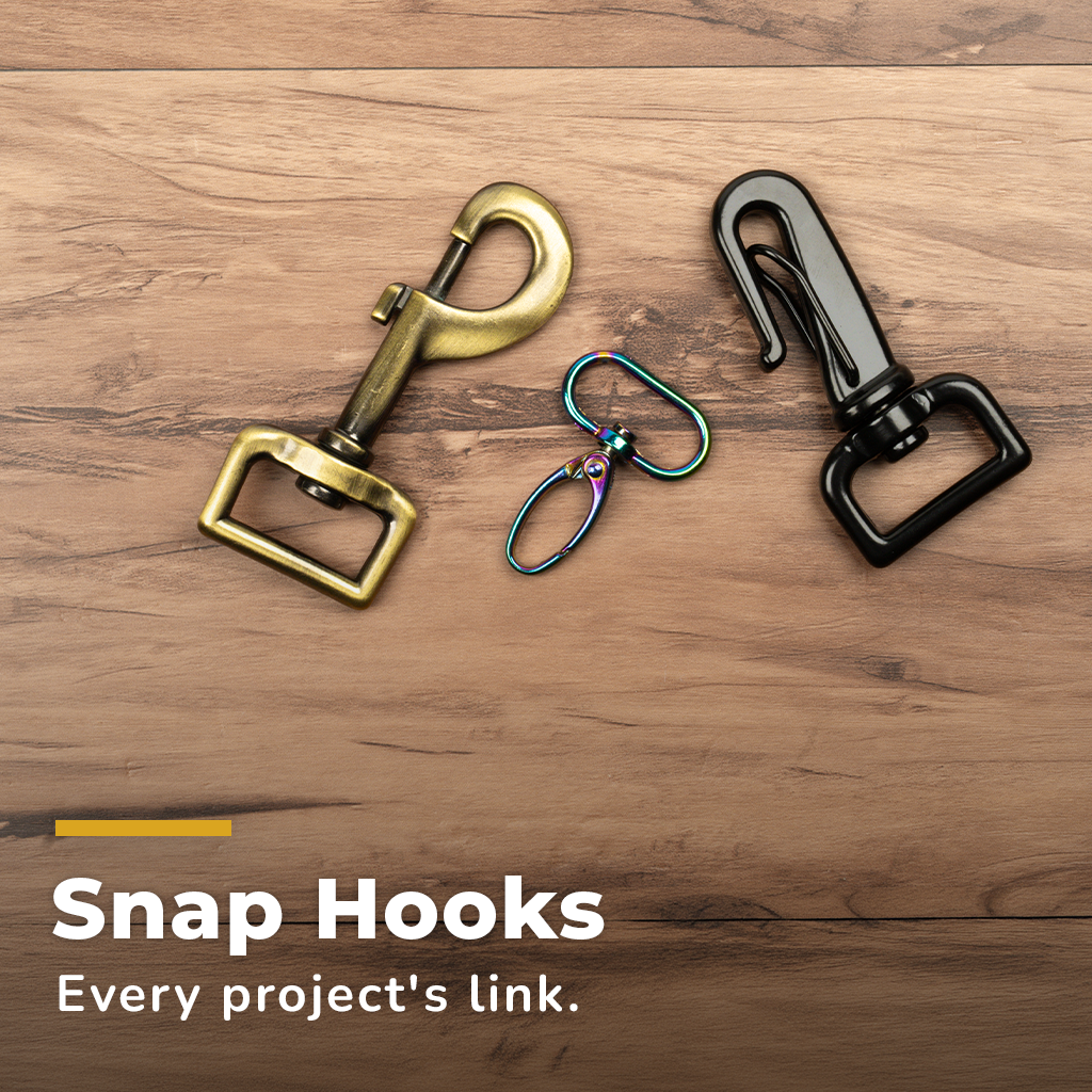 Snap Hooks. Photo of scattered snap hooks in multiple finishes.
