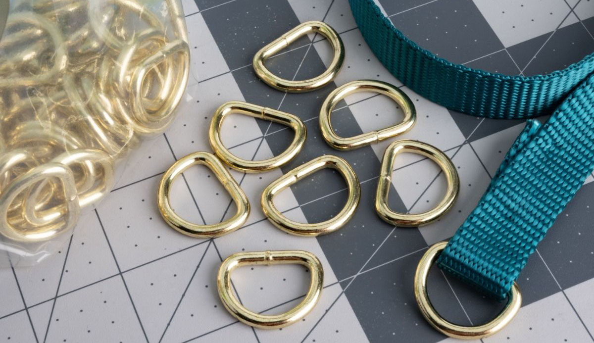 Gold D-rings with Teal Nylon webbing