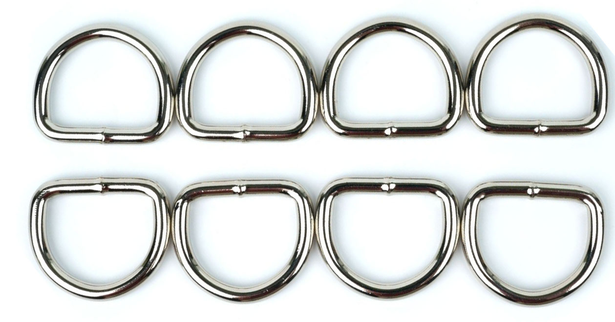 silver d-rings in a row