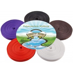 A closeup photo showcasing different colors of nylon webbing appropriate for lawn furniture repairs